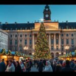 Bécsi karácsonyi vásár a Rathausplatzon, díszfával és látogatókkal.