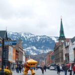 Utcai jelenet Québec városában, gyönyörű hegyekkel a háttérben.