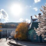 Ostrava városkép tavaszi napsütésben, virágzó fák és színes épületek.