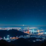 Kóbe éjszakai panoráma a Rokko-hegyről, csillagokkal az égen