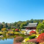 Korakuen kert varázslatos tája Japánban, élénk színek és nyugodt víz.