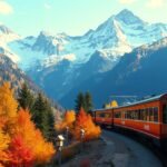 Svájci vonatút az Alpok gyönyörű színeivel az őszi tájon.