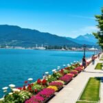 Ouchy sétány a Genfi-tó partján, virágokkal és pálmafákkal