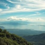 Gyönyörű táj Tibat környékén, zöldellő dombokkal és vízparttal.