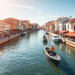 Aveiro csatornája napsütésben, csónakkal a vízen.