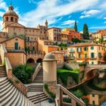 Girona város látképe, Trónok Harca lépcsőivel és színes házakkal az Onyar folyónál.