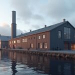 A Mustad horoggyár épülete Gjøvikben, Norvégiában, naplementében.