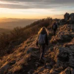 Hikers on the trail at Nagy-Milic in Zemplén during sunset